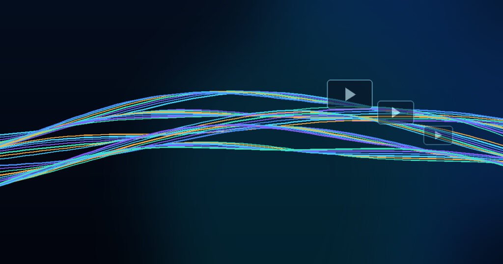 Glowing fibre-optic strands carrying digital video data across a dark background.